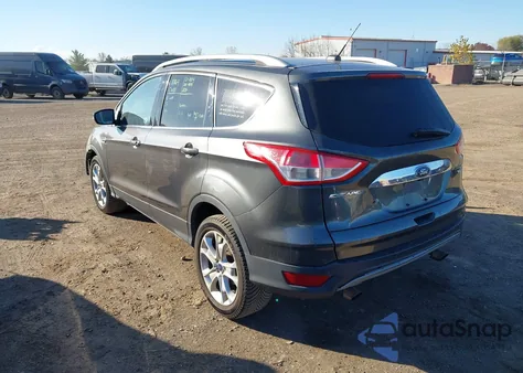 2016 Ford Escape Titanium z USA, uszkodzony, nr VIN 1FMCU9J90GUC55507